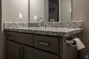 Trailwood Village Apartments by Corinthians Asset Management Interior Washroom with Mirror View